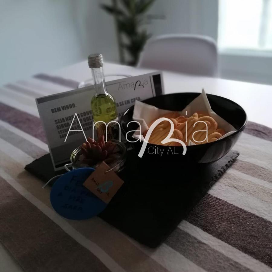 Amariacity Al *